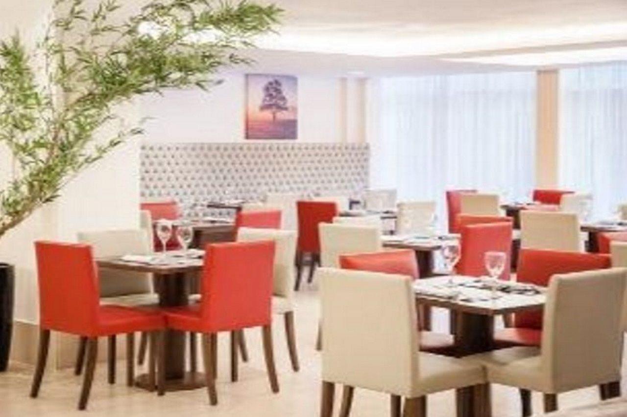 Ramada Hotel & Suites Campos Pelinca Кампус дус Гойтаказиш Екстериор снимка